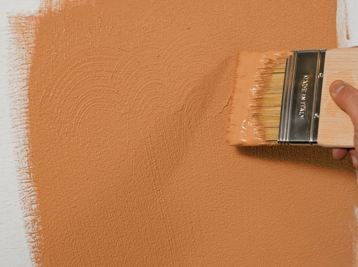 Decork Mediterraneo being painted onto a wall