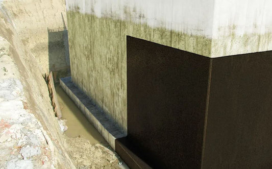 Concrete wall with a small water channel and steps leading to it