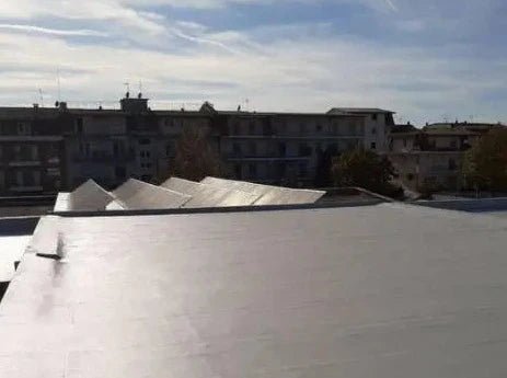 Roof top with acriflex pro and buildings in background