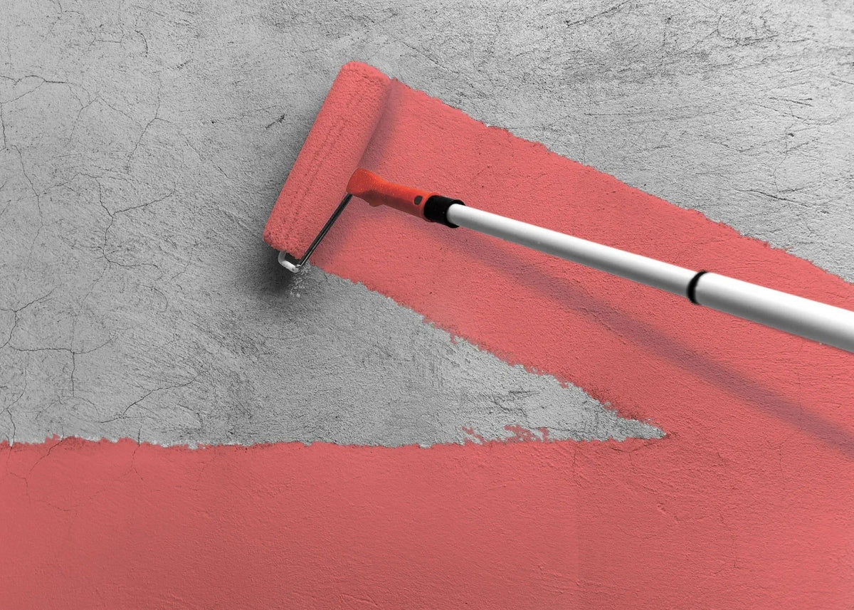 Acriflex X - Pro being applied onto concrete with a roller