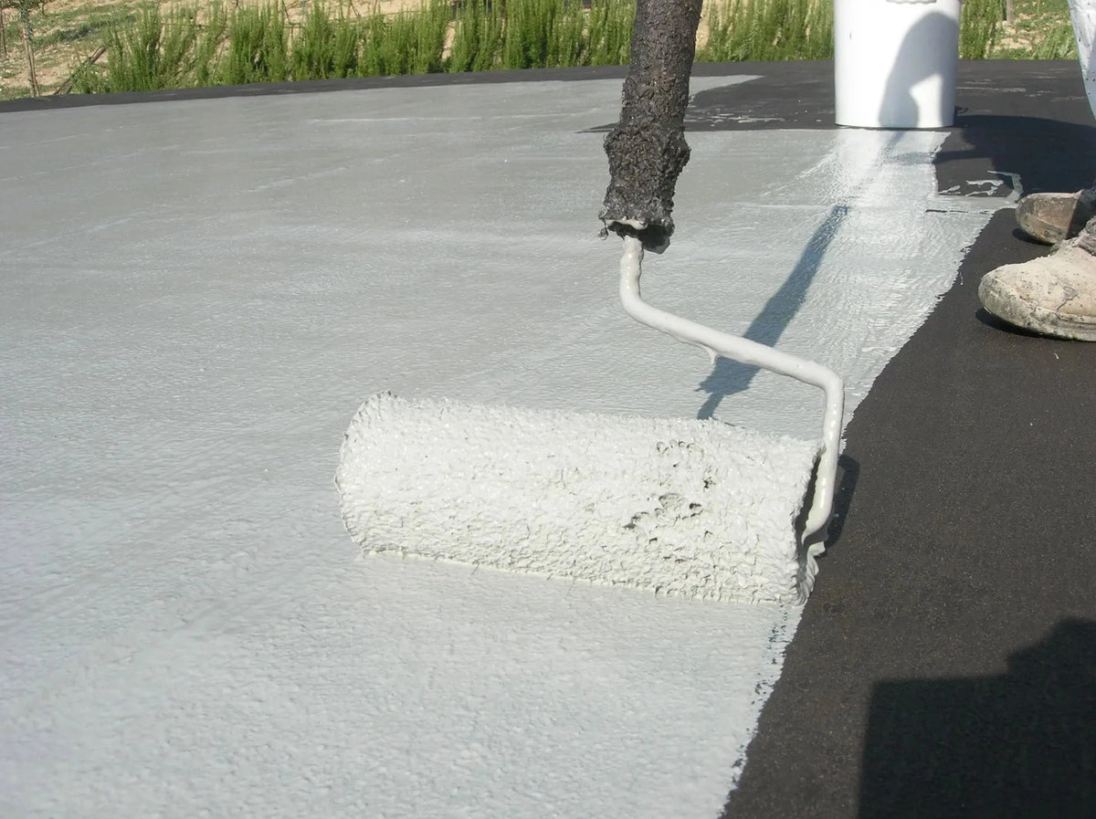 acriflex fybro being applied by roller outdoors