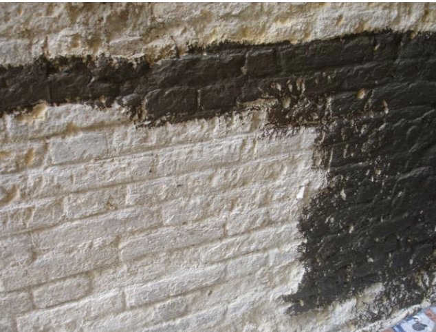 C.W.C. Stop Condense applied to a brick wall
