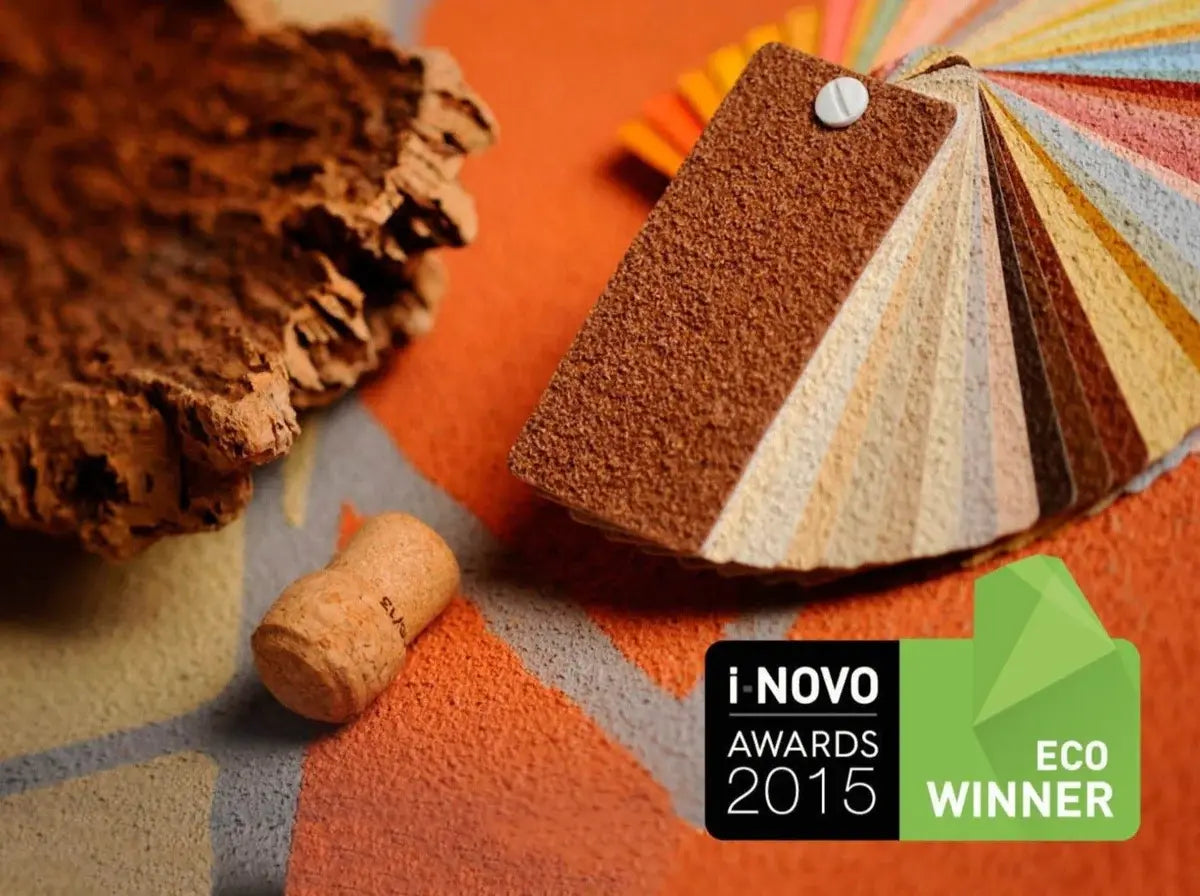 Color swatch book with cork sample on an orange background, featuring 2015 Eco Winner badge.