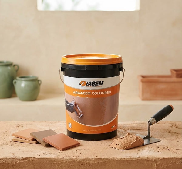Diasen Argacem Coloured paint bucket on a construction site with tools and materials.