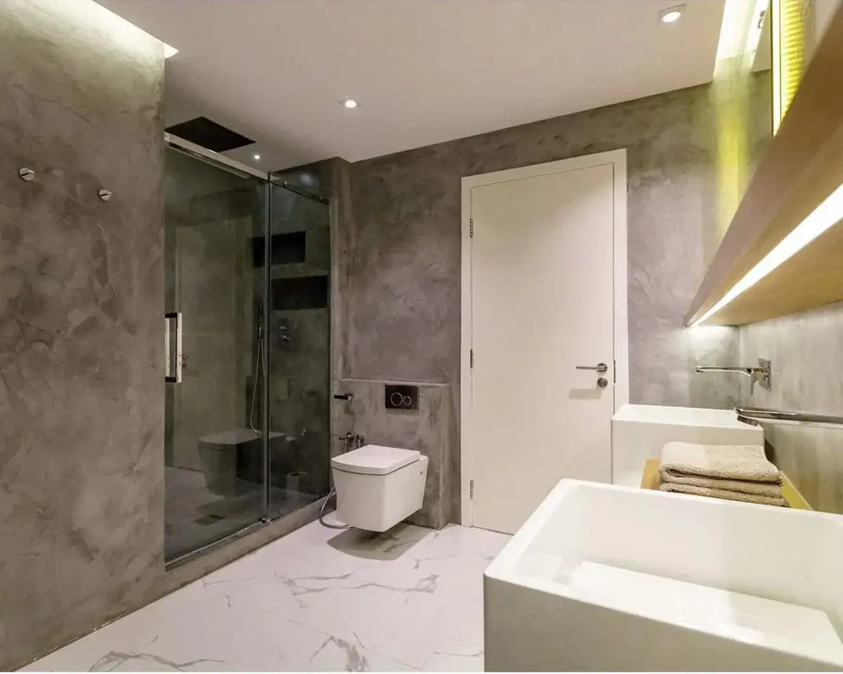 Modern bathroom with microcement walls in the shower and on walls